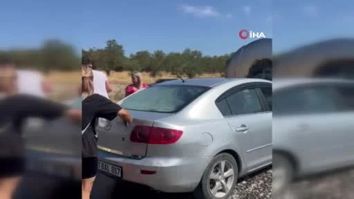 Ayvalık'ta alev alan otomobili beton mikseri kurtardı